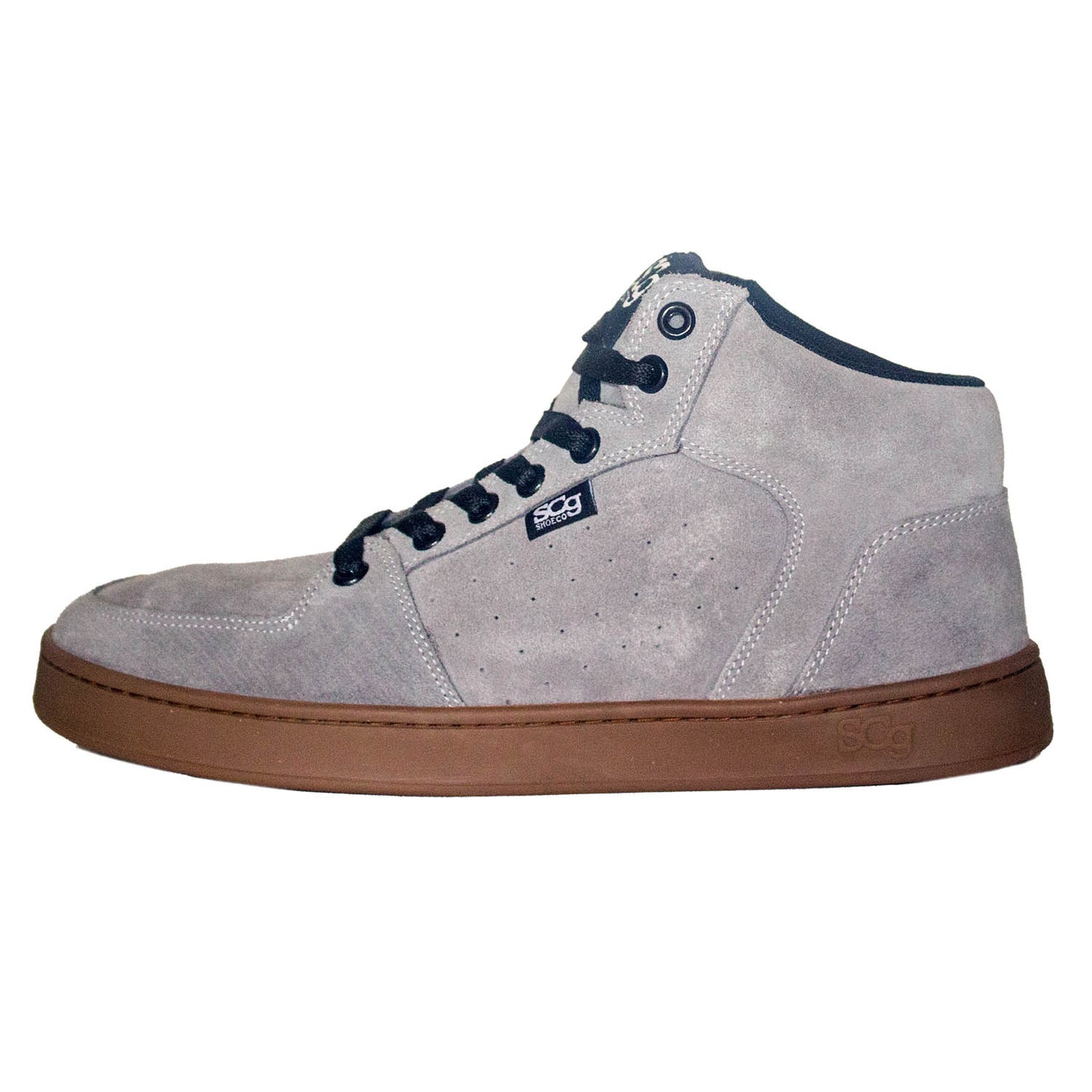 A grey suede high-top BMX shoe with a lace-up closure, designed for mountain and BMX riding, featuring a mid-sole and outsole with the brand name visible.